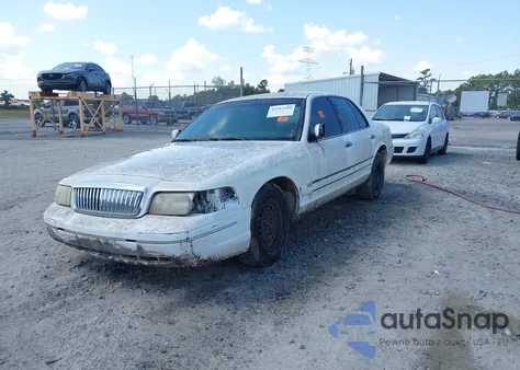 1999 Mercury Grand Marquis Gs z USA, uszkodzony, nr VIN 2MEFM74W7XX734151